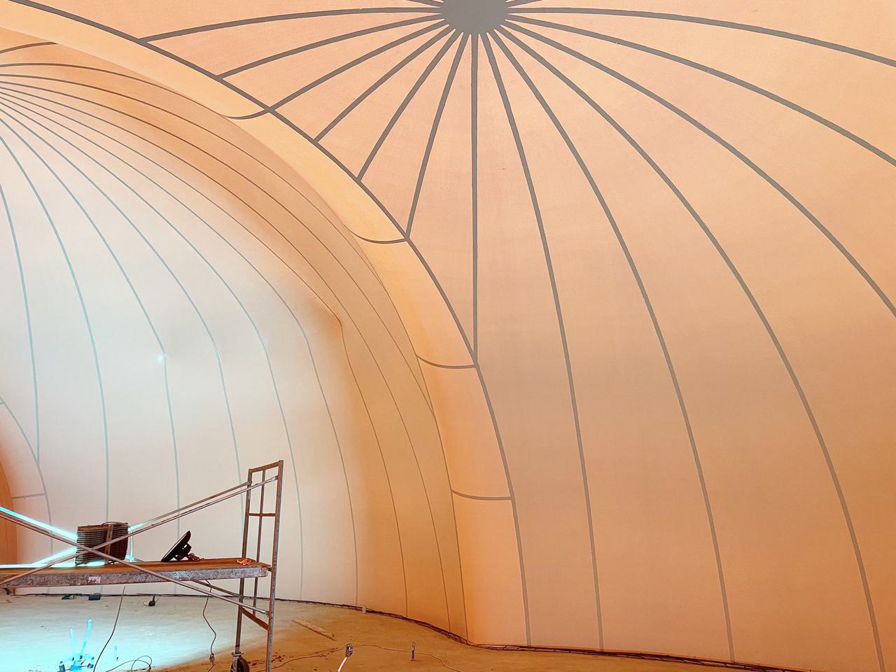 Two starbursts and a saddle in the Airform pattern for this dome home comprised of four interconnected domes.